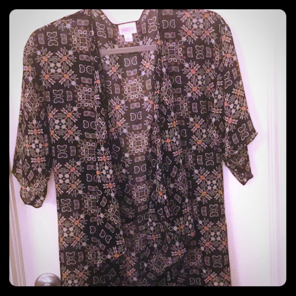 LuLaRoe sheer jacket with fringe at bottom size sm